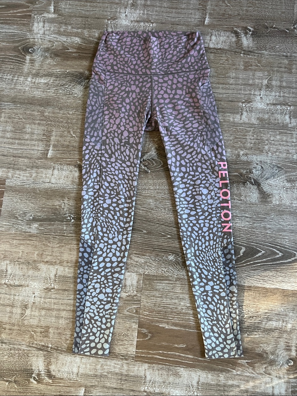 Like new! Peloton x With patterned leggings with mesh detailing size Small